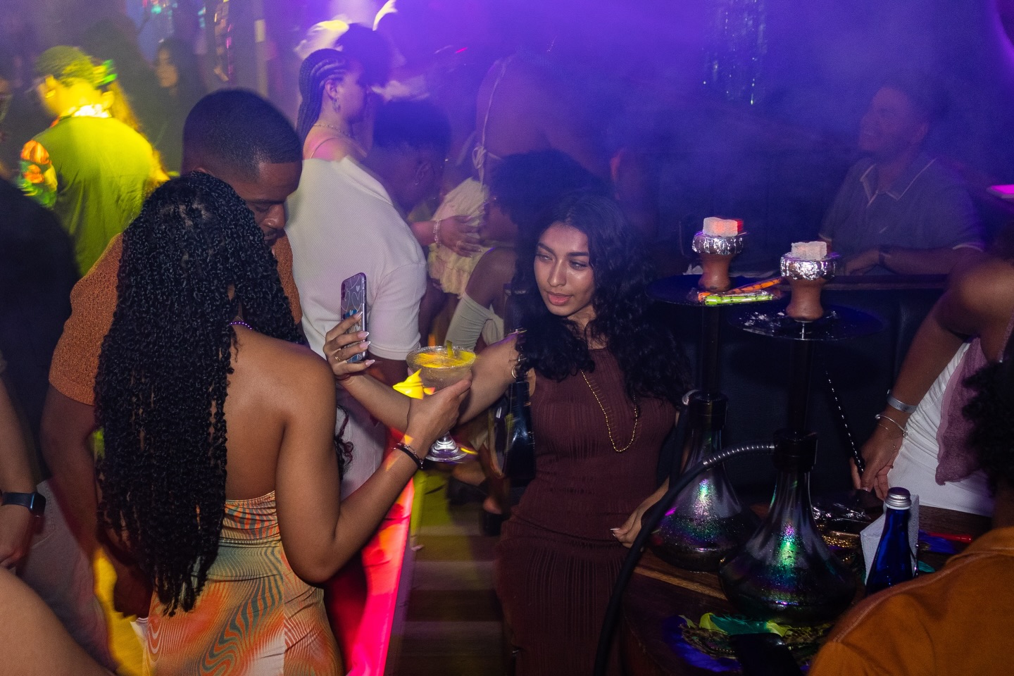 Crowd and hookah lounge at Rhythms Gastro Bar during Fiestas de Independencia Cartagena
